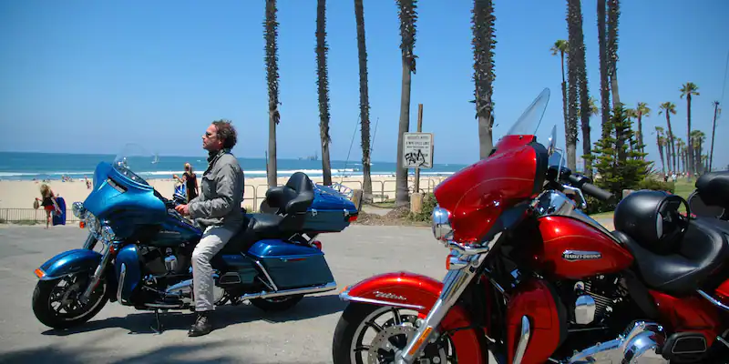 On Highway Number One: Two cylinders and a man's dream: With a Harley through the USA-cylinders