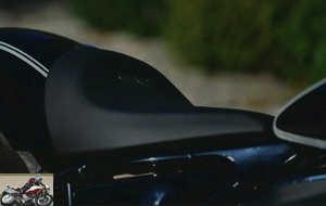 A saddle at 690 mm, with a metal BMW plate in the backrest