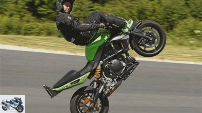 Motorcycle wheelie in theory and practice