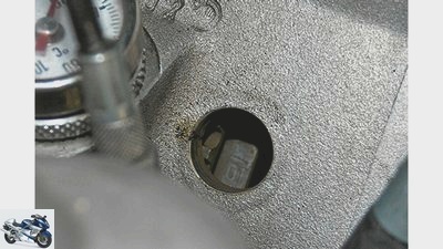 Adjust valves on a motorcycle